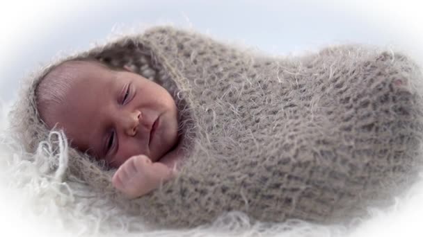 Baby is covered with  woollen cloth - Footage, Video