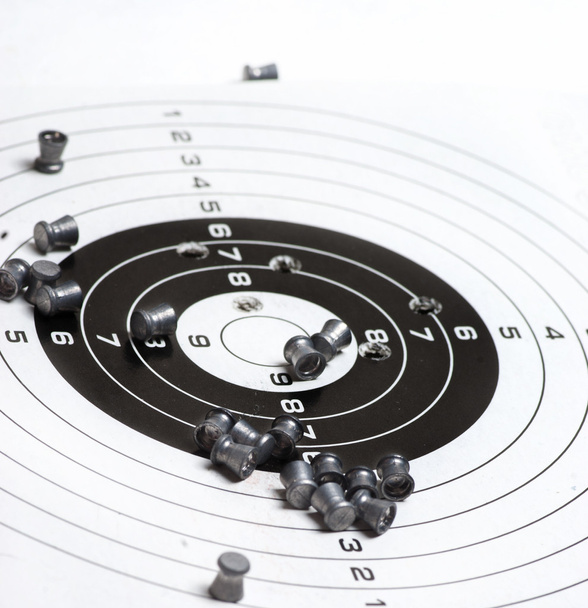Paper rifle target with bullet holes - Foto, imagen