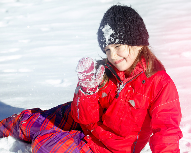 Happy little girl in snow. Nice winter time - Photo, Image