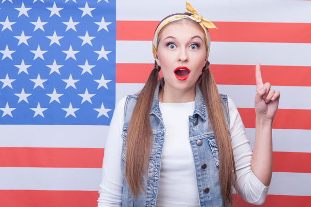 Cheerful young American woman has a great idea - 写真・画像