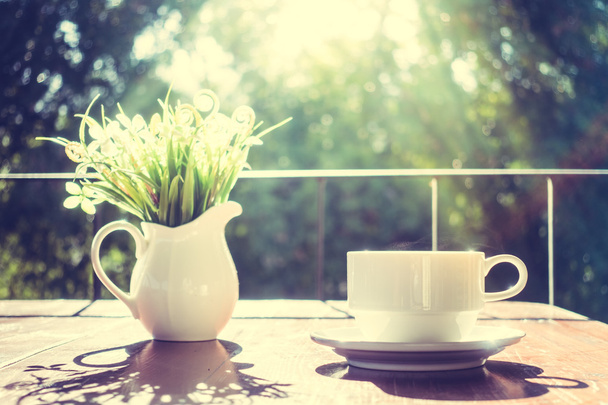 White coffee cup and vase plant - Photo, Image