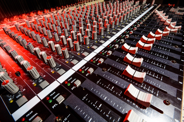detail sound mixer in red and white light with great perspective - Zdjęcie, obraz