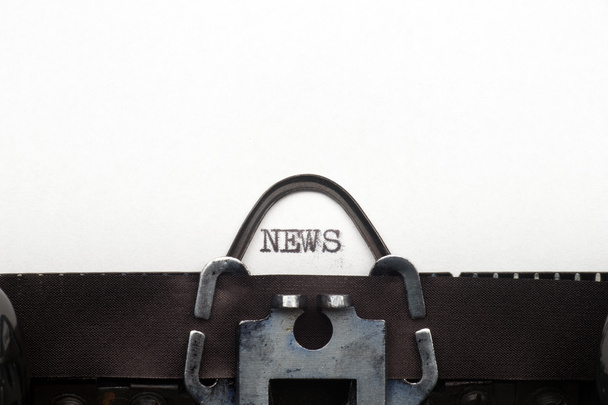 News text on retro typewriter - Photo, image