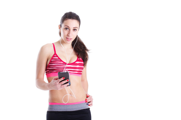 fit girl listening music by earphones - Photo, image