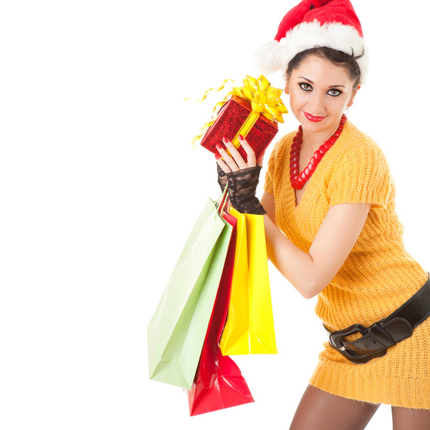 Fun santa woman with christmas gifts - Фото, изображение