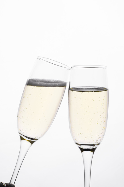 two glasses of champagne on white background - 写真・画像