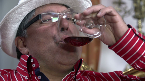 Man with a glass of red wine - Footage, Video