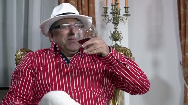 Man with a glass of red wine - Footage, Video