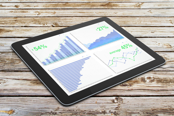 Business chart on digital tablet screen on wooden table - Φωτογραφία, εικόνα