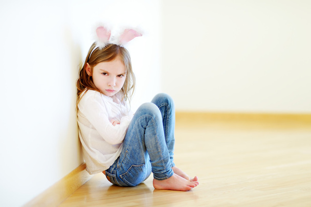 little girl wearing bunny ears - Fotó, kép