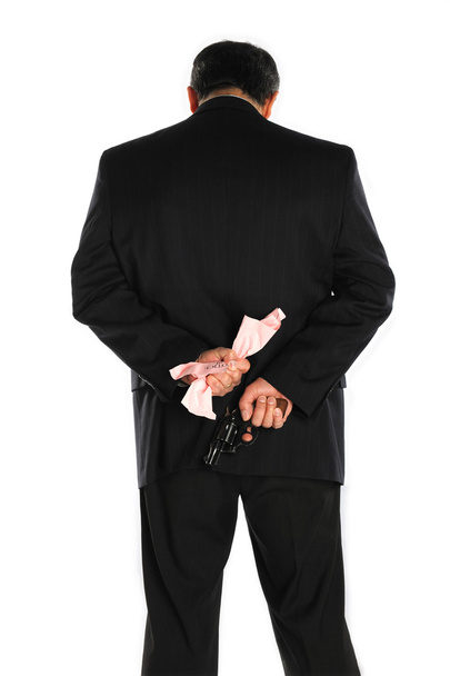 Pistole hinter dem Anzug - Foto, Bild