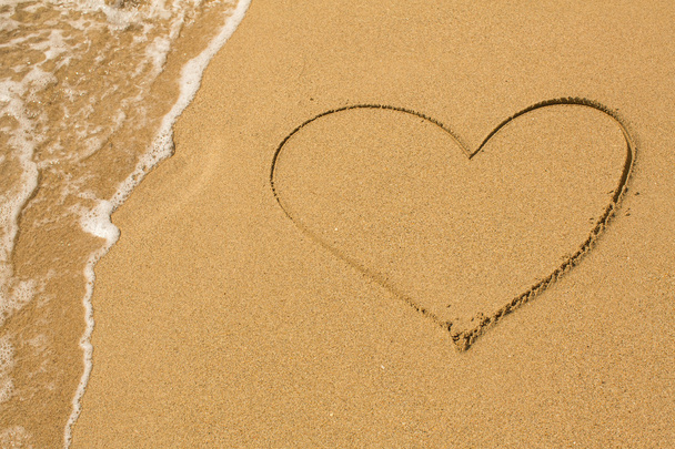 Heart drawn on beach sand - Photo, Image
