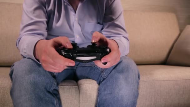 Playing Videogames with Gamepad - Filmmaterial, Video