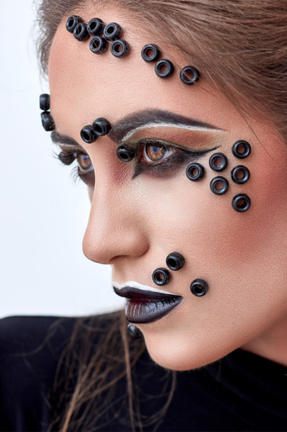 Girl, fashion makeup, black beads on face, dark lips,  portrait. - 写真・画像