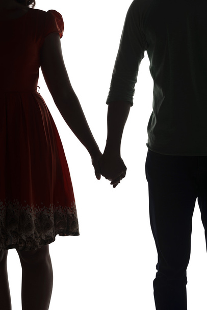 Silhouette of couple holding hands - Fotoğraf, Görsel