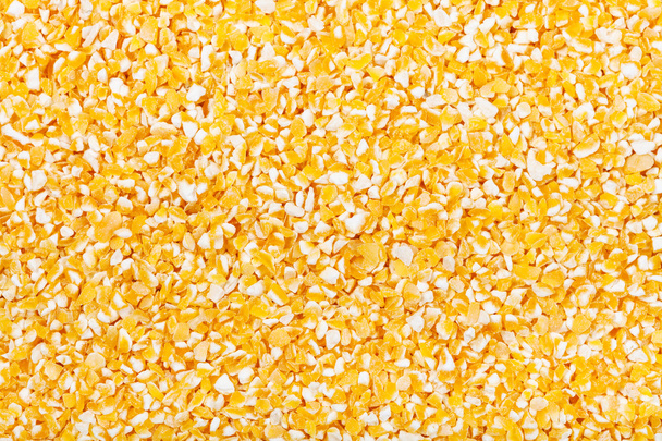 grañones de maíz molido amarillo crudo
 - Foto, imagen