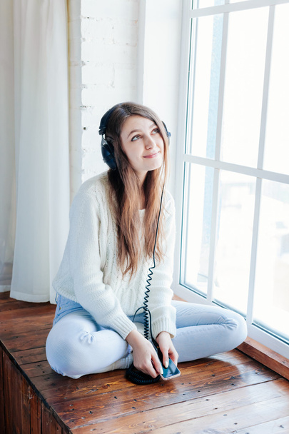 woman listening music with headphones. relax and unwind - Фото, зображення