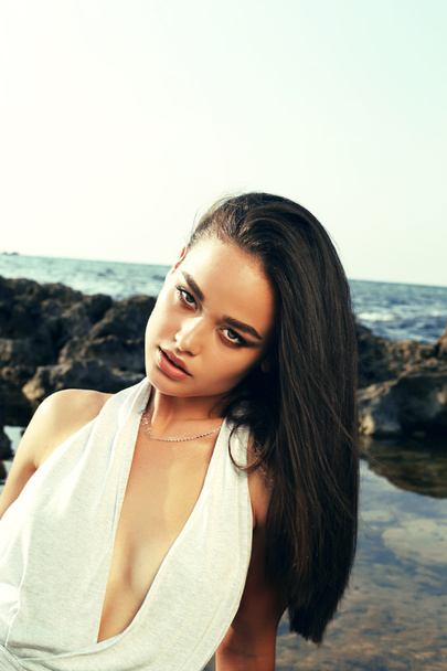 sexy girl wears elegant swimsuit,posing on the summer beach   - Fotografie, Obrázek