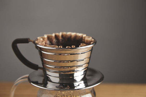 close up of transparent chrome drip coffee maker - Фото, изображение