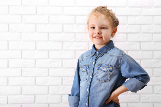 Little girl in jeans suit - Fotoğraf, Görsel