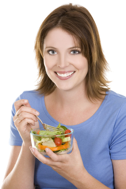 Casual woman eating salad - Foto, afbeelding