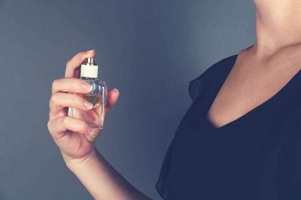 woman applying perfume  - Foto, Imagem