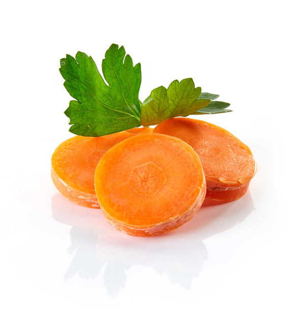carrot slices and parsley - 写真・画像