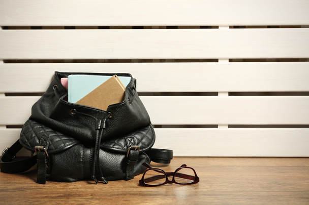 female backpack with book - Foto, Bild
