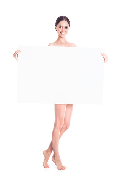 Sexy naked girl with a poster. Clean skin. Hair removed. Isolate. For advertising and presentation. - 写真・画像