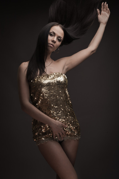 Gorgeous brunette woman dancing - Valokuva, kuva