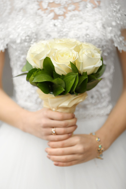 Wedding bouquet in hands  - Photo, image