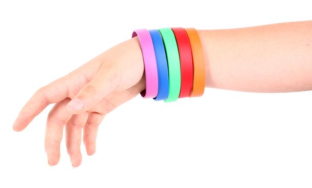Hand with colorful bracelets - Fotoğraf, Görsel
