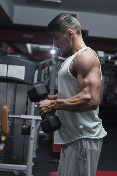Bodybuilder at gym - Photo, image