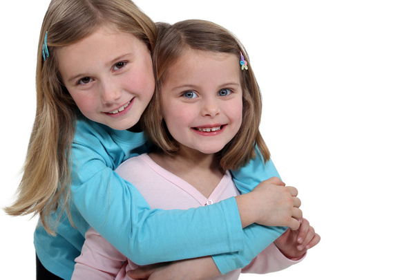 Two little girls embracing - Zdjęcie, obraz