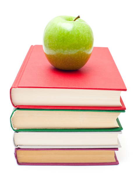 Apple on stack of books - Foto, imagen