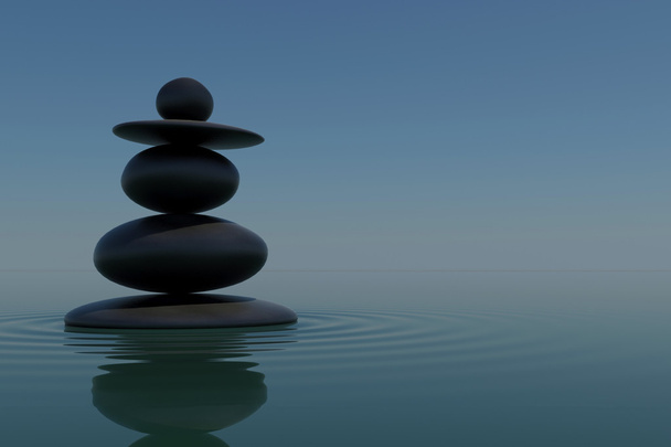 Piedras Zen pila refleja en el agua
 - Foto, Imagen