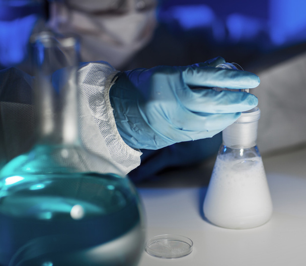 close up of scientist making test in laboratory - Foto, Bild