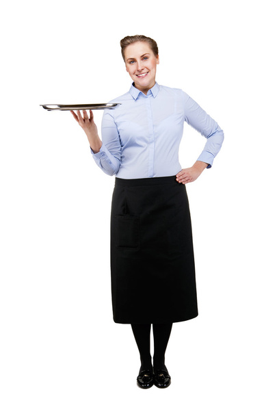 Waitress holding tray isolated over white background. Smiling. W - Foto, Imagen
