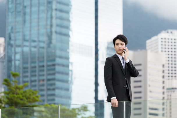 Aasialainen komea liikemies liikeasussa
 - Valokuva, kuva