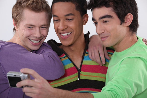 Three young men taking a photo of themselves - Photo, image