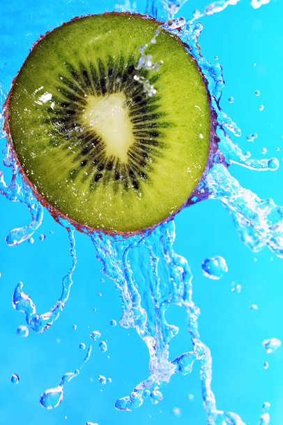 slice of kiwi in water bubbles - Photo, Image