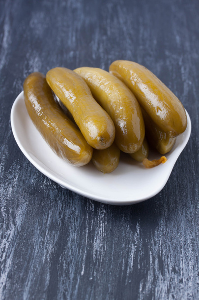 cucumbers pickle on a plate - Фото, зображення