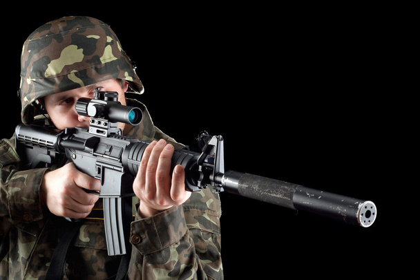 Armed man taking aim - Photo, Image