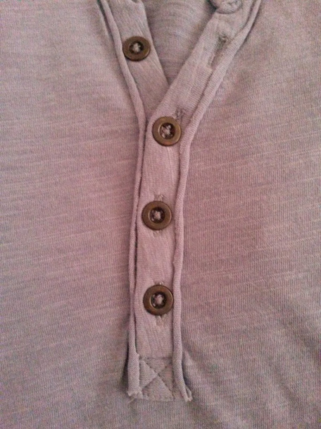 Grey fabric shirt detail with buttons - Photo, Image