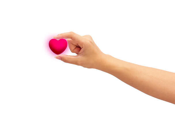 ροζ καρδιά στα χέρια του ανθρώπου, απομονώνονται σε λευκό φόντο. - Φωτογραφία, εικόνα