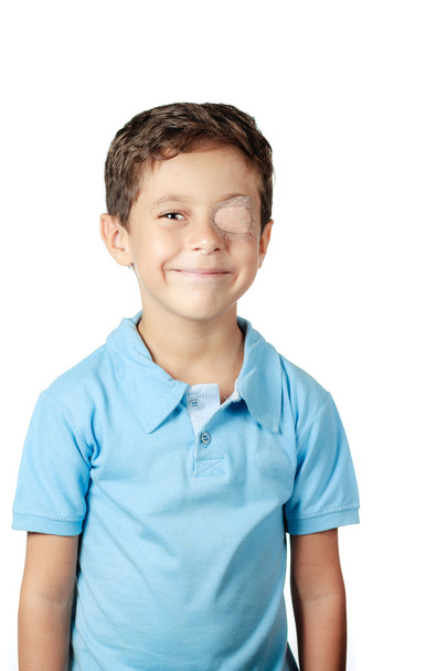 Child with eye patch isolated on white background - Фото, зображення