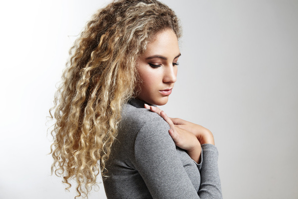 woman with curly blond hair - Photo, Image