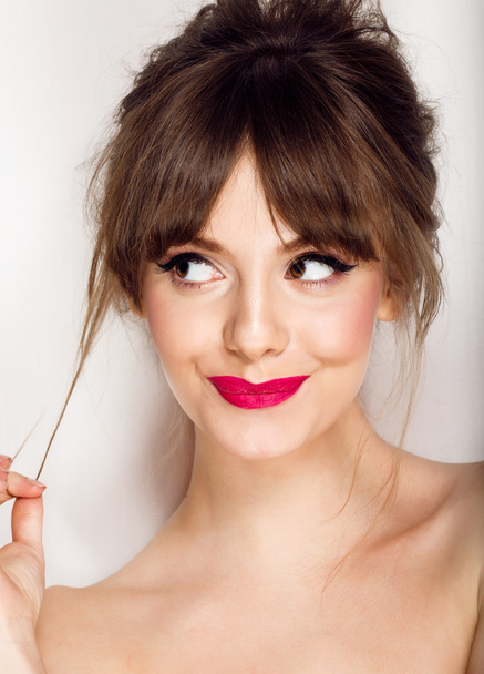 Woman face with hair motion pink lipstick, smile - Zdjęcie, obraz