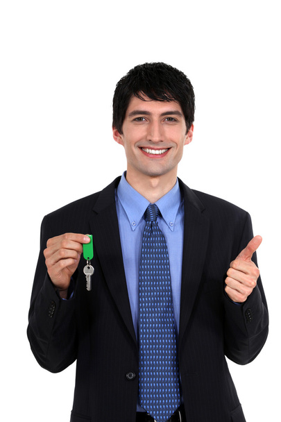 Car salesmen holding keys - Photo, Image