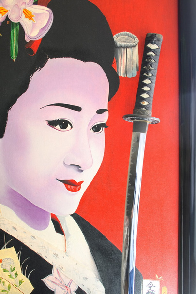 Geisha y espada
 - Foto, Imagen